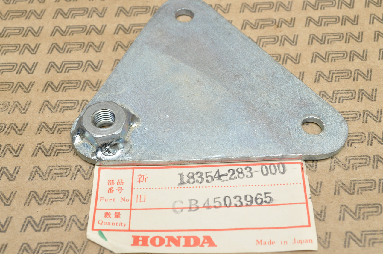 NOS Honda CB450 K0 Left Exhaust Muffler Mount Bracket 18354-283-000