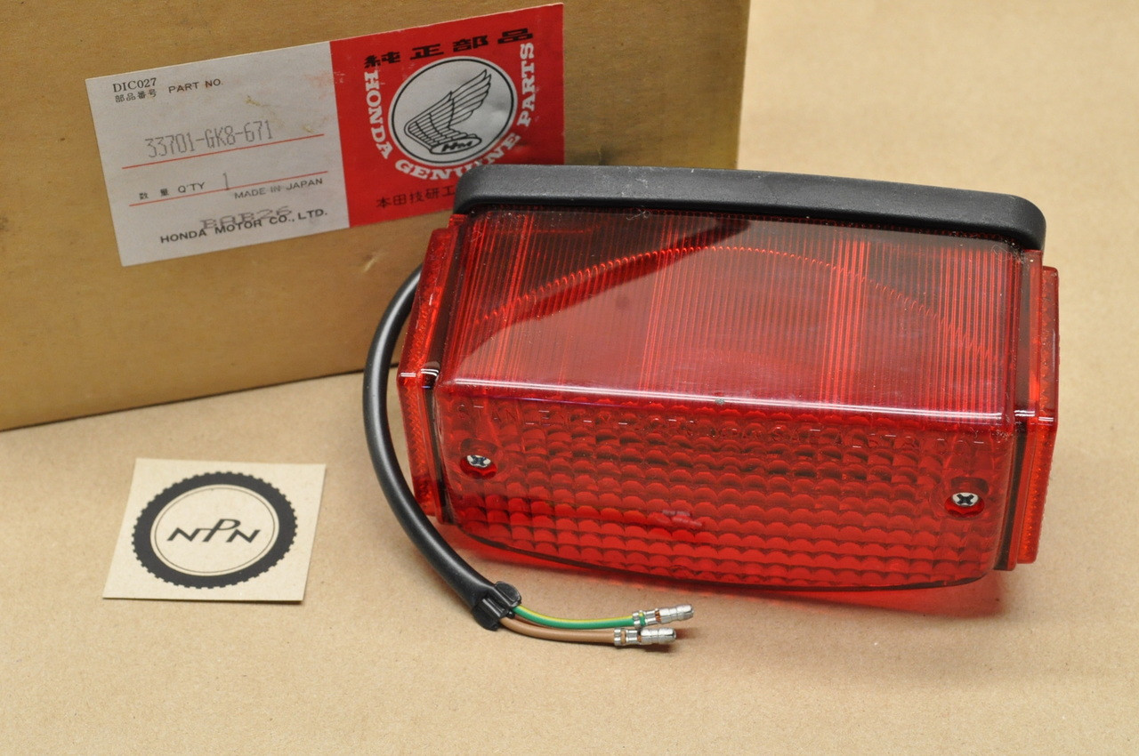 NOS Honda 1984-87 NQ50 Spree Rear Brake Tail Light Assembly 33701-GK8-671