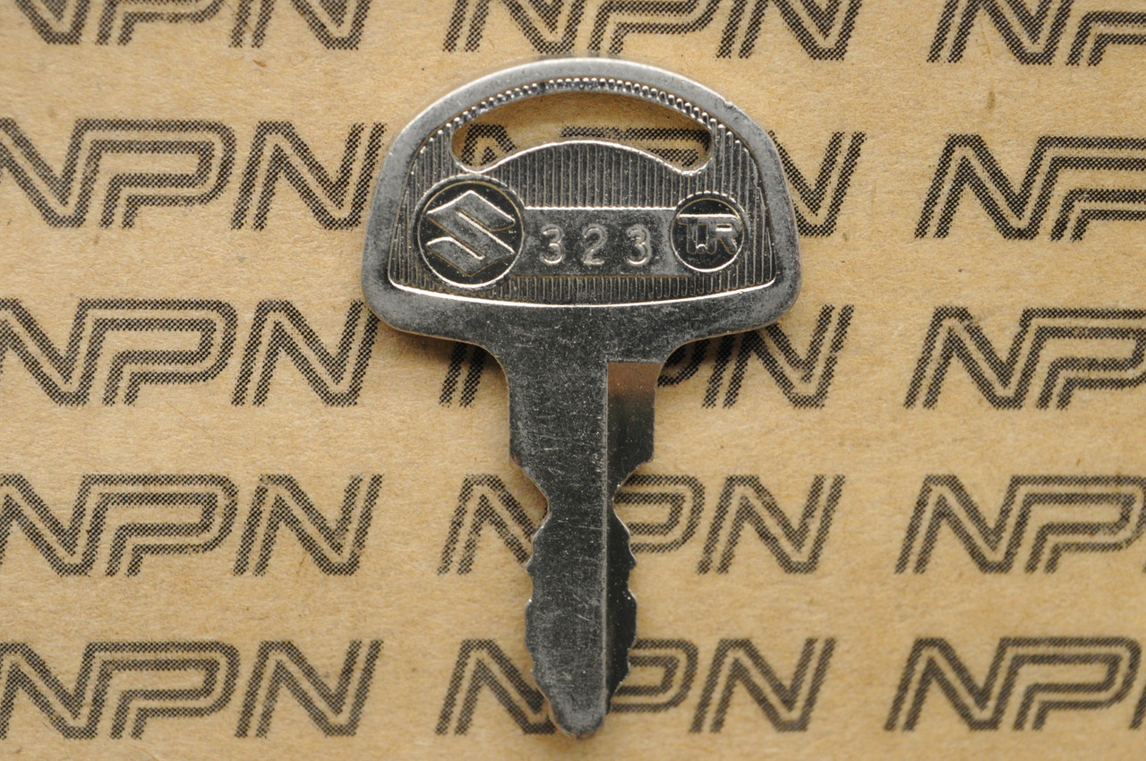NOS Suzuki Motorcycle Ignition Lock Double Groove Key # 323