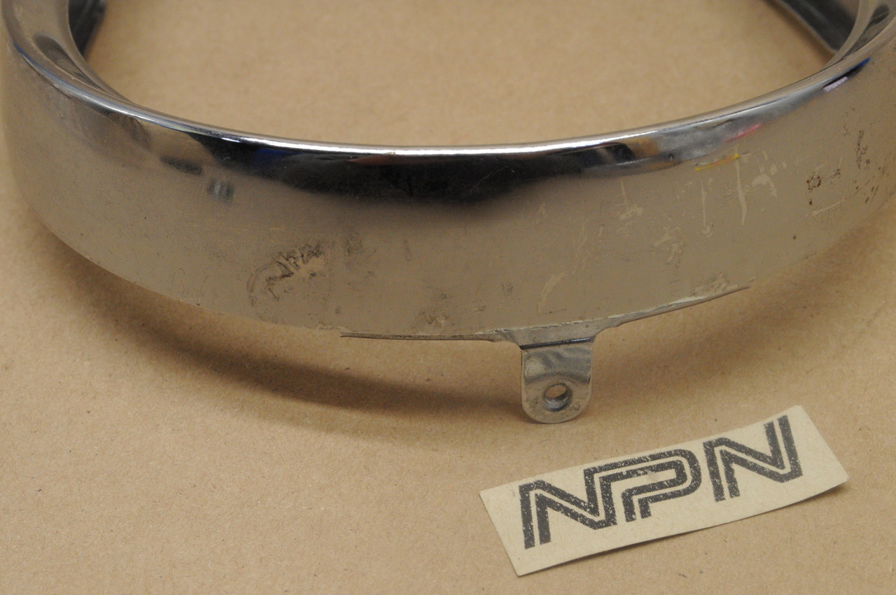 NOS Suzuki B100 Head Light Bezel Rim 35111-11031