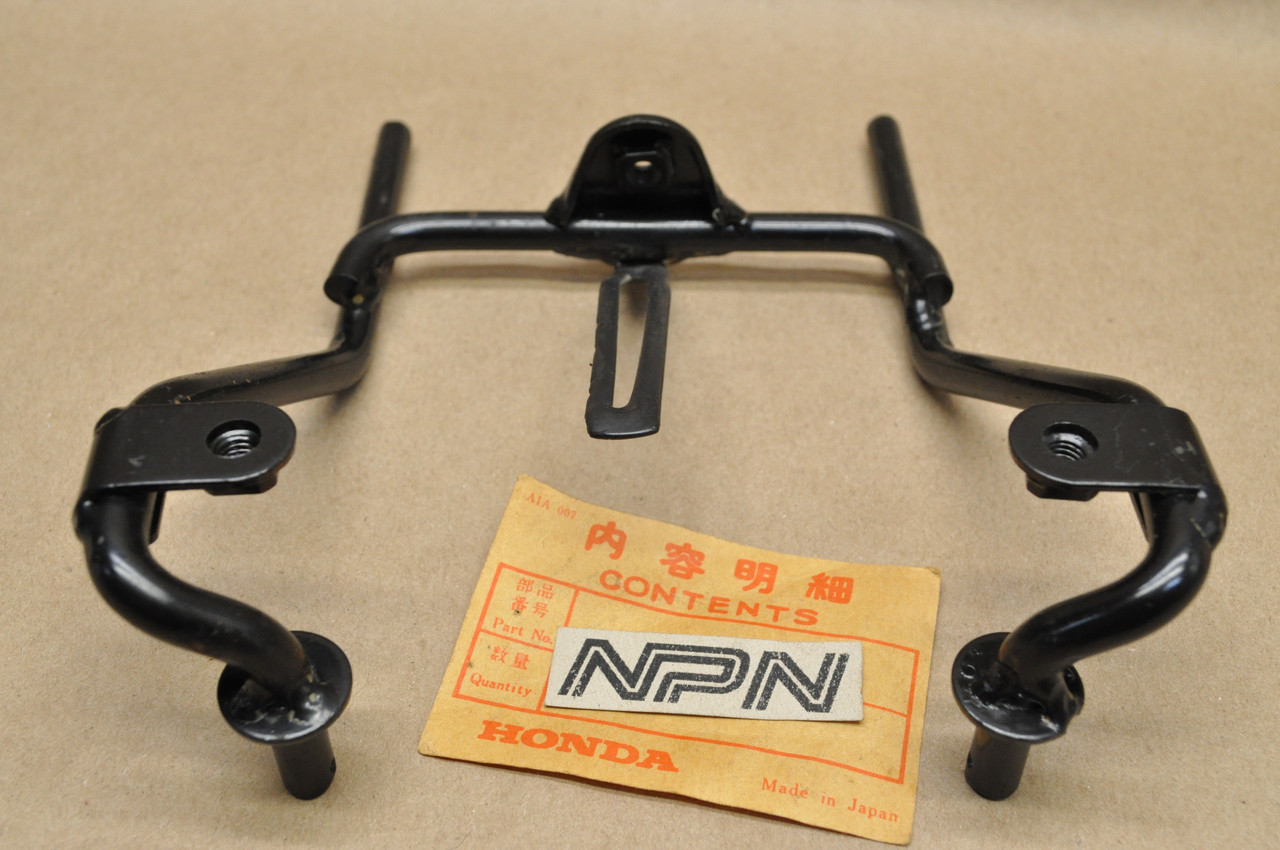 NOS Honda 1983 ATC110 Head Light Case Stay Mount Bracket 61310-943-000