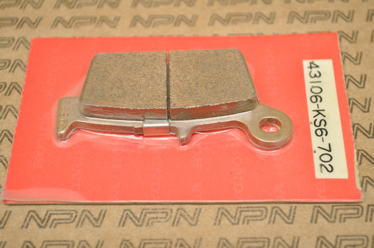 NOS Honda CR125 CR250 CR500 CR80 XR250 XR600 Brake Caliper Pad 43106-KS6-702