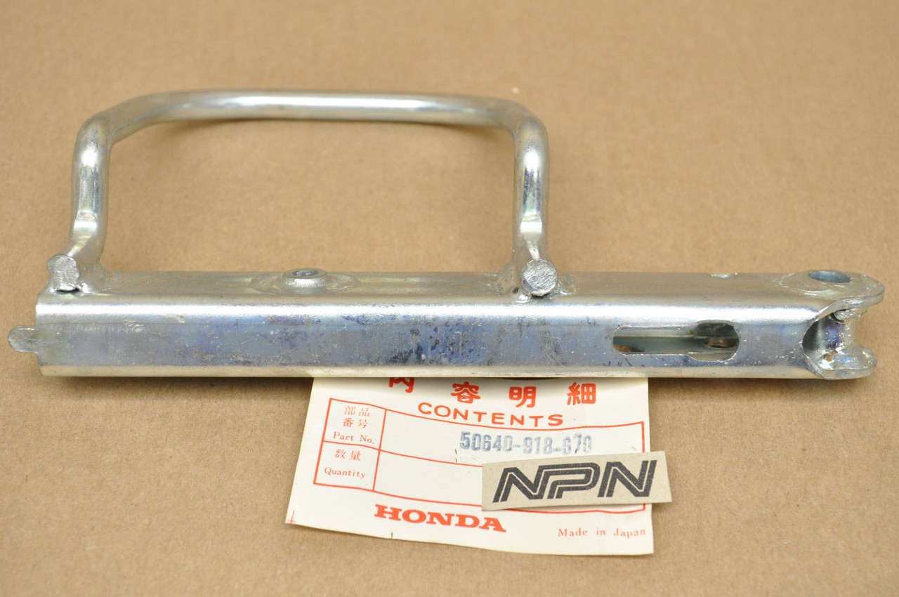 NOS Honda ATC90 Left Side Foot Peg Rest Step Bracket 50640-918-670
