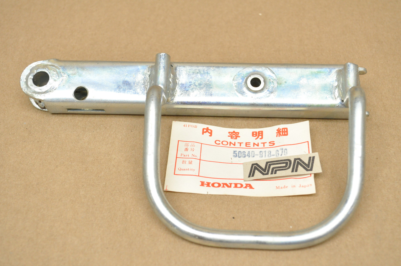 NOS Honda ATC90 Left Side Foot Peg Rest Step Bracket 50640-918-670