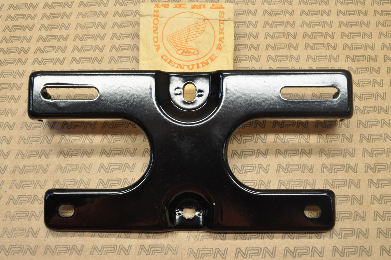 NOS Honda PA50 Hobbit Tail Light License Plate Bracket 84701-148-672 B
