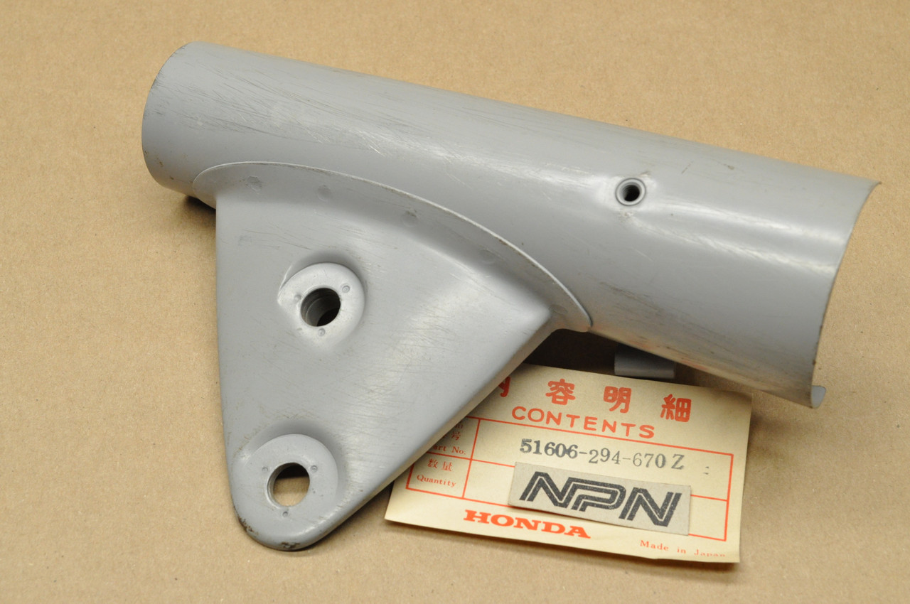 NOS Honda CL450 K2-K4 Left Fork Ear Head Light Stay Cover 51606-294-670 Z