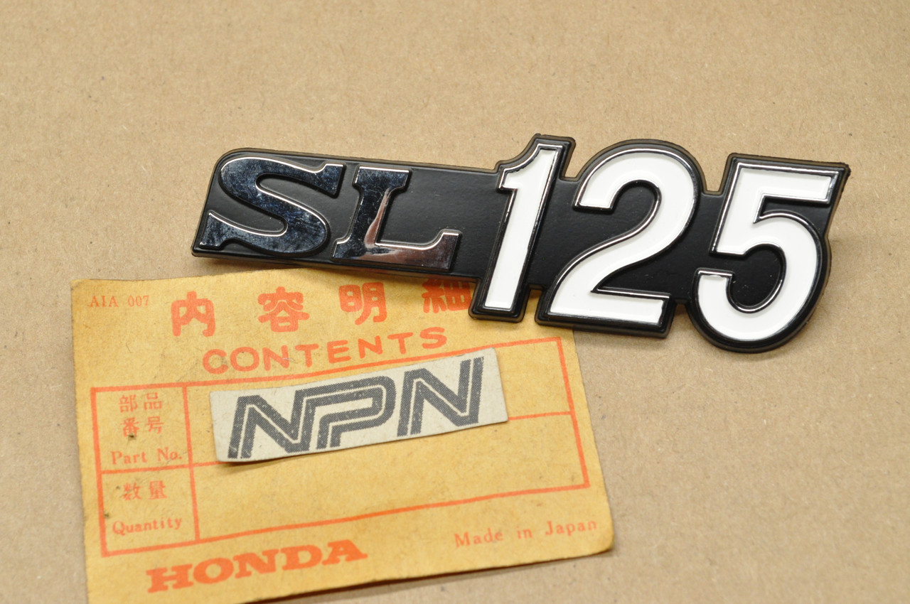 NOS Honda SL125 K0 Side Cover Emblem Logo Badge 87128-331-670