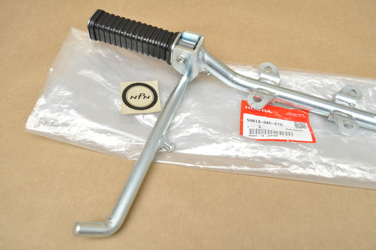NOS Honda Z50 A K0-K2 Foot Peg Step Bar Bracket & Kick Stand Assy 50610-045-670