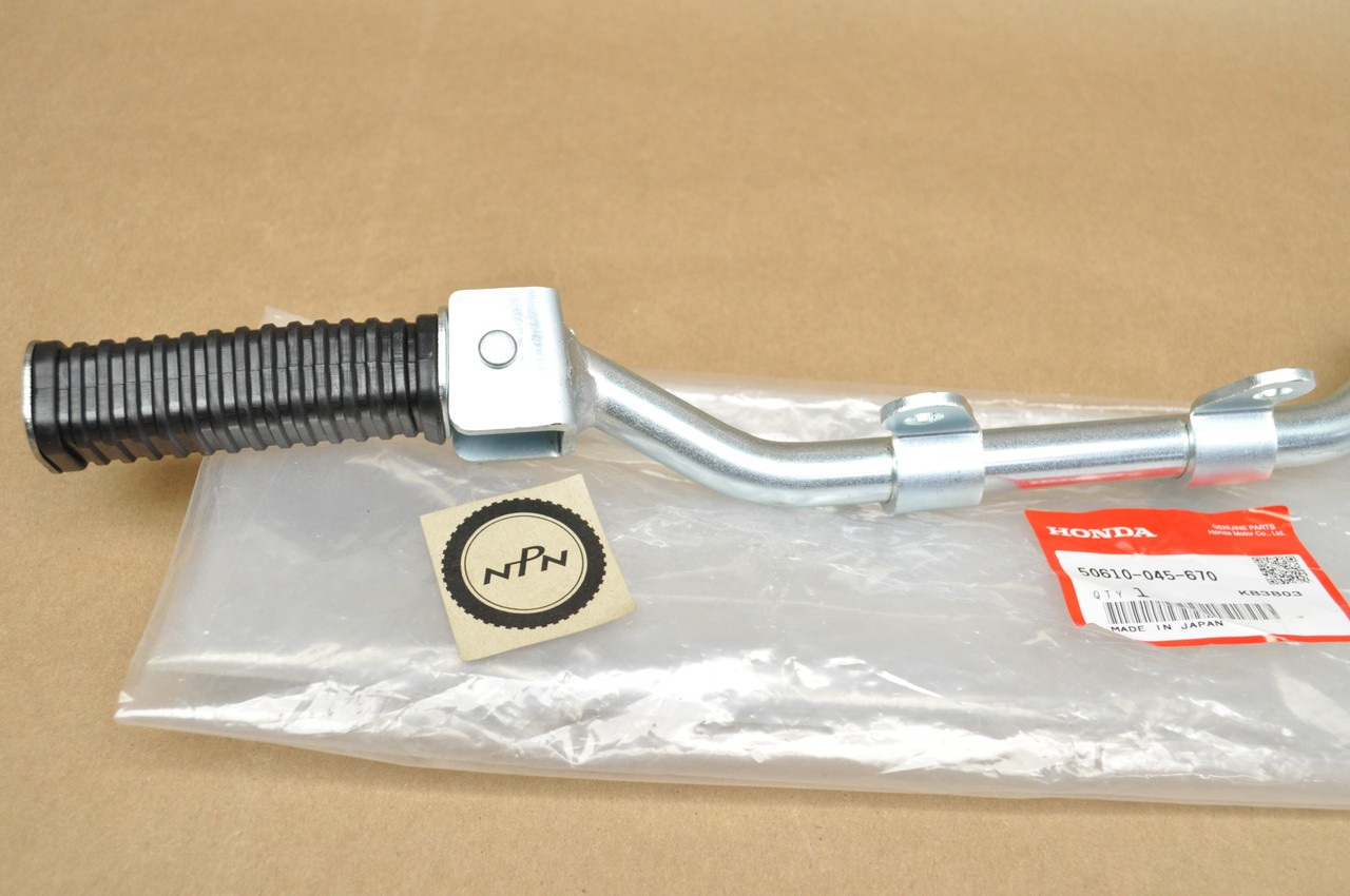 NOS Honda Z50 A K0-K2 Foot Peg Step Bar Bracket & Kick Stand Assy 50610-045-670