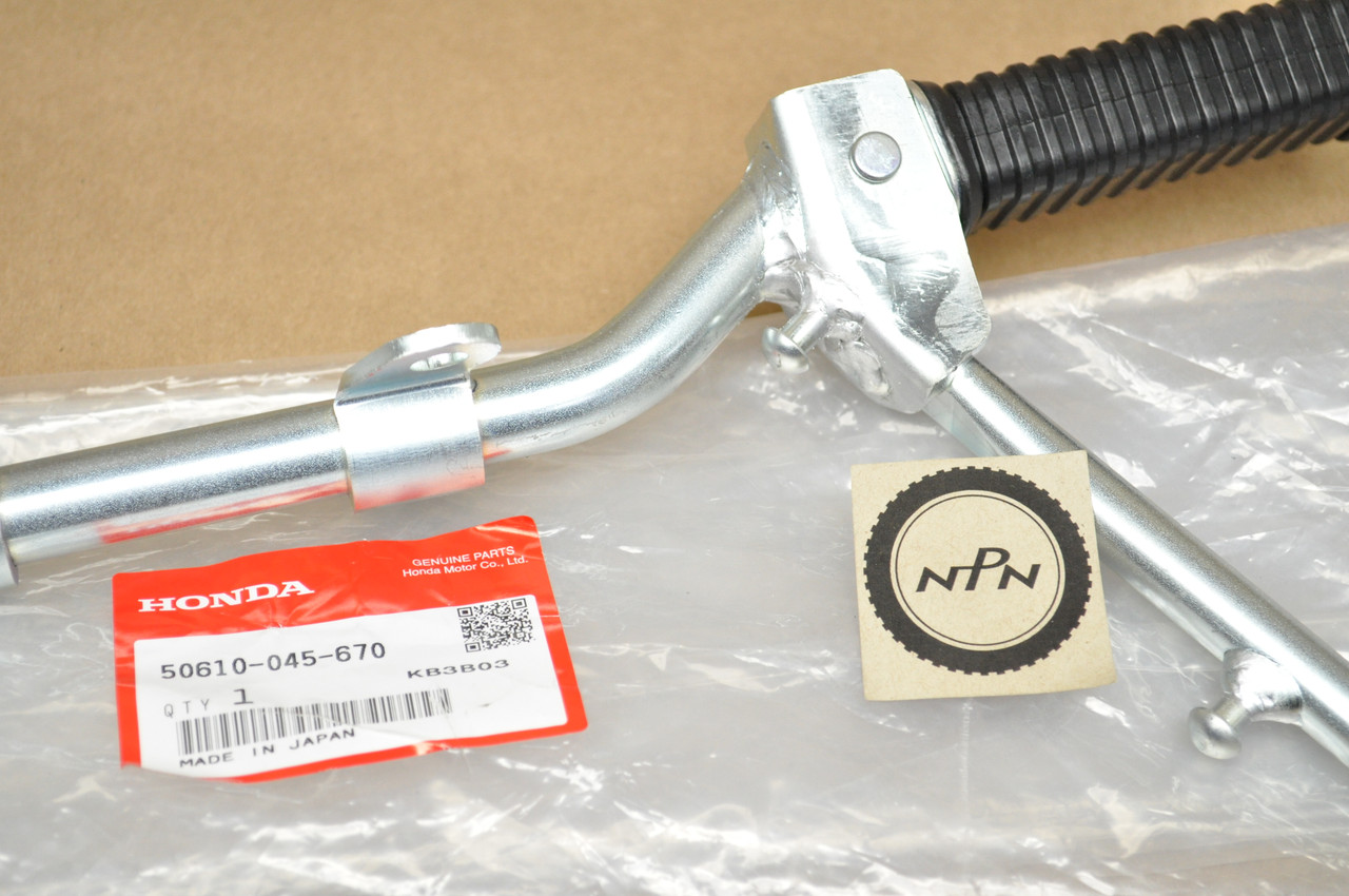 NOS Honda Z50 A K0-K2 Foot Peg Step Bar Bracket & Kick Stand Assy 50610-045-670
