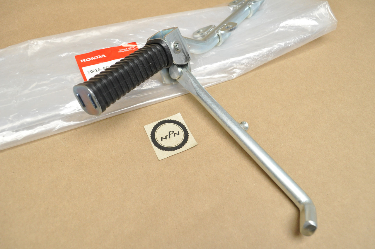 NOS Honda Z50 A K0-K2 Foot Peg Step Bar Bracket & Kick Stand Assy 50610-045-670
