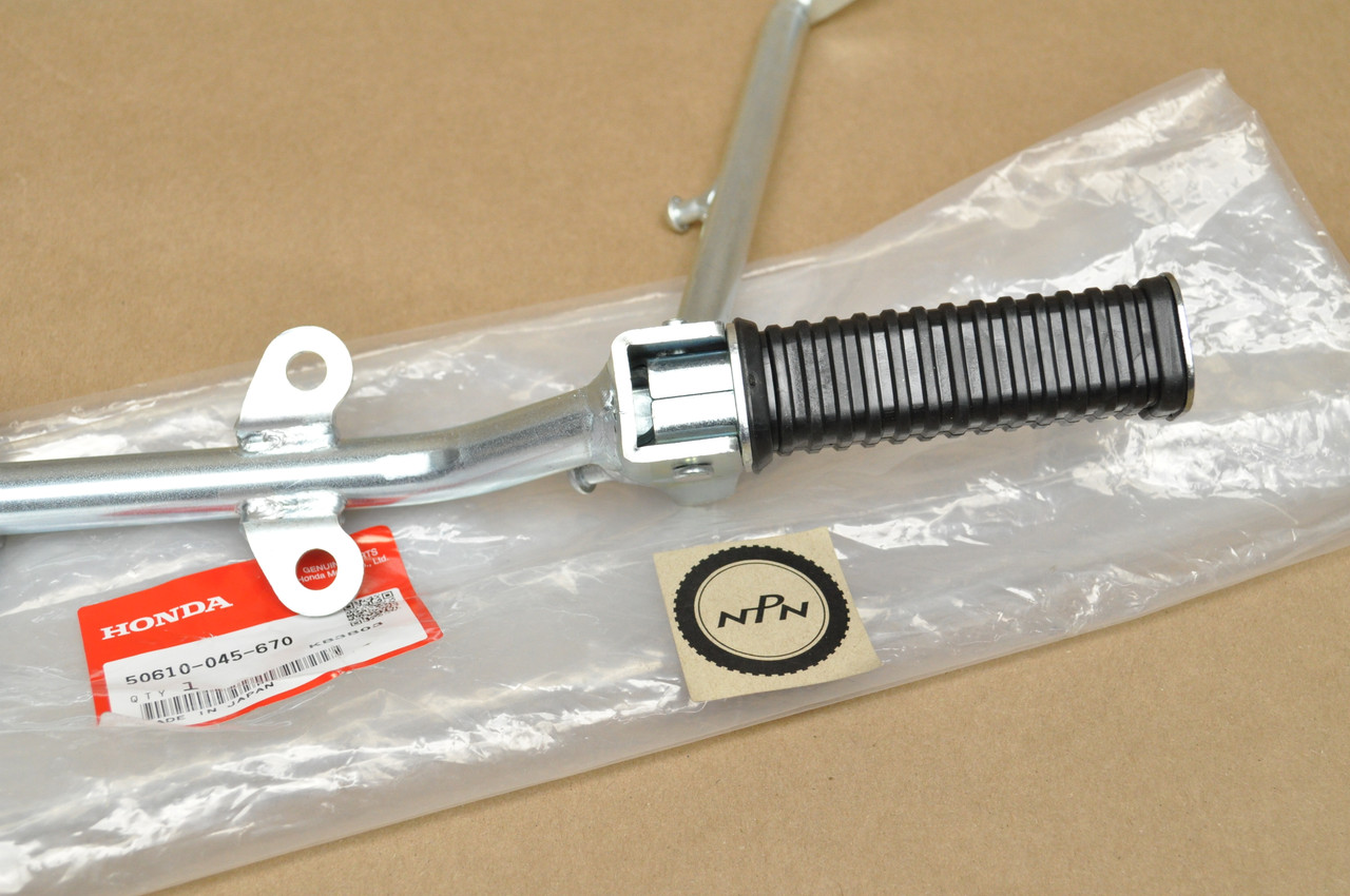NOS Honda Z50 A K0-K2 Foot Peg Step Bar Bracket & Kick Stand Assy 50610-045-670