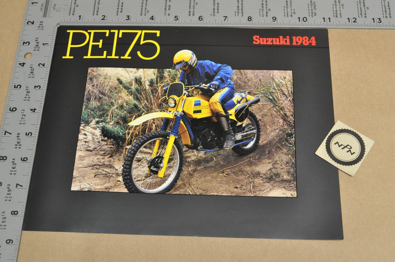 Vintage NOS 1984 Suzuki PE175 Motorcycle Brochure OEM Dealer Stamp Specs MX