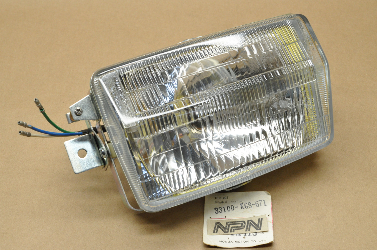 NOS Honda 1984 NH125 Aero Head Light Lamp w/ Mount Ring 12V 33100-KG8-671