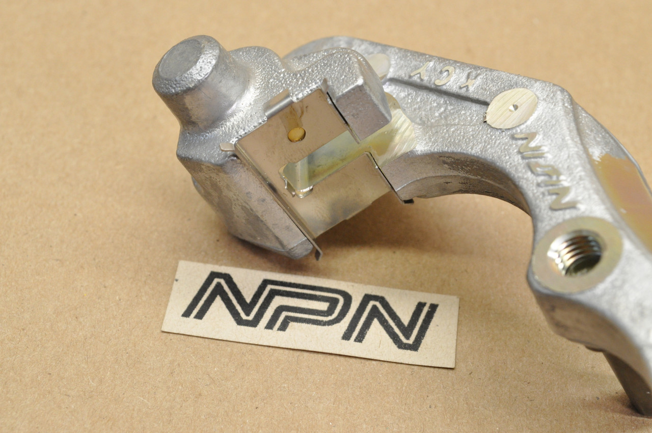 NOS Honda CR125 R CR250 R XR650 Left Front Brake Caliper Bracket 45190-KZ4-J21