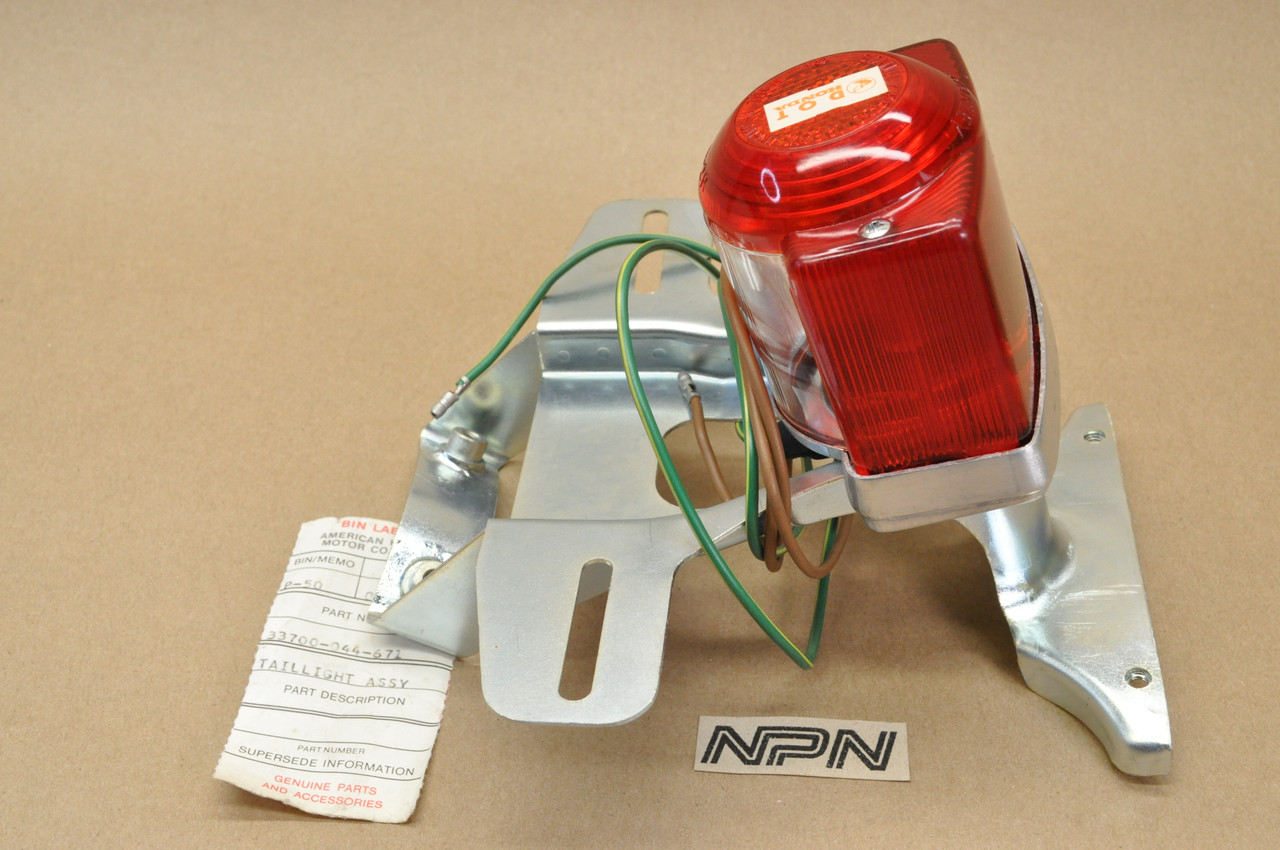 NOS Honda P50 Tail Light Lamp & License Plate Mount Bracket Assembly 33700-044-671