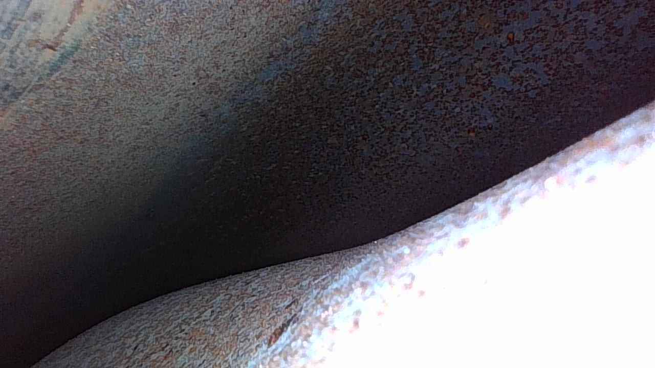 Left side of the fuel tank
