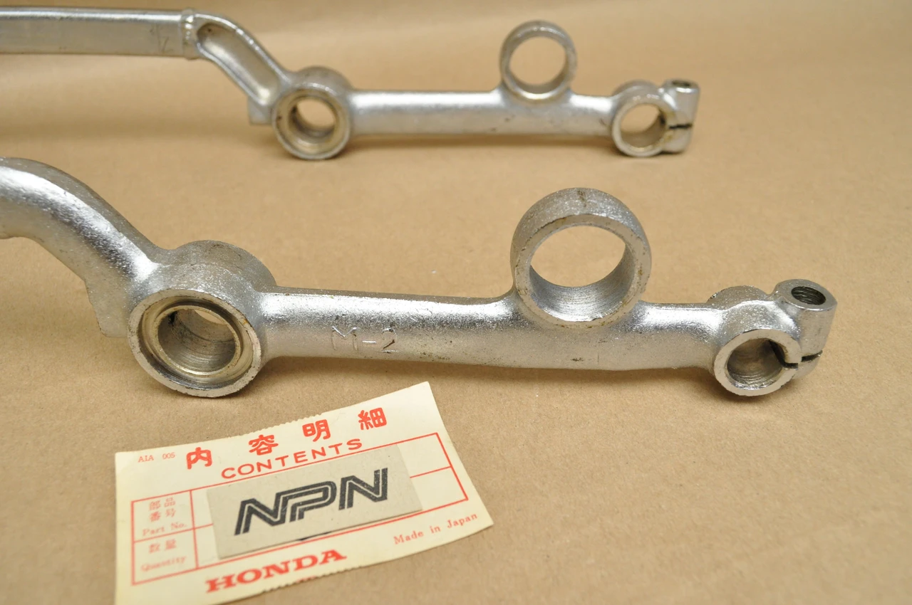 NOS Honda CA72 CA77 Front Fork Suspension Arm Bracket 51210-253-000