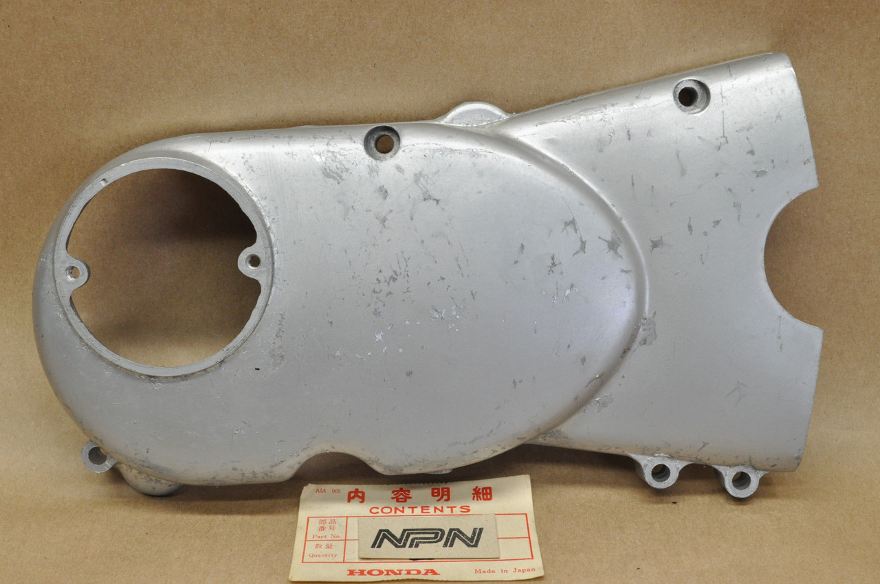 NOS Honda C100 CA100 C105 Left Stator Chain Sprocket Side Cover 11341-001-060