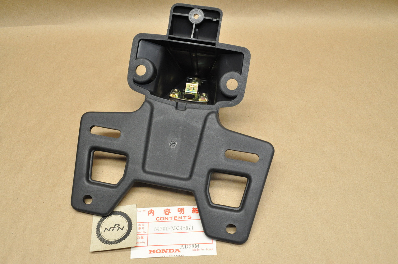 NOS Honda TLR200 Reflex XL100 XL125 XL185 XL200 XL250 XL500 XL80 Taillight  License Plate Bracket 84701-MC4-671