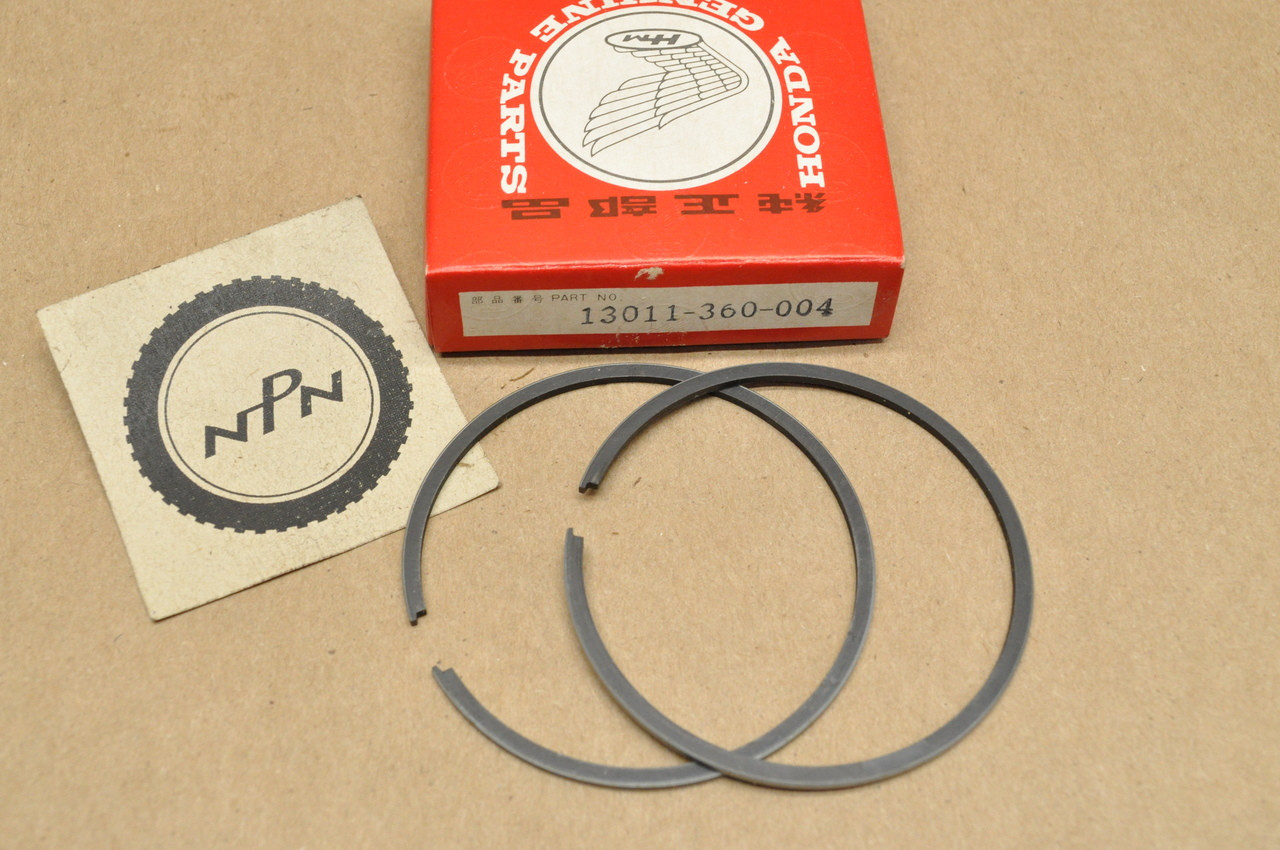 NOS Honda CR125 M Standard Size Piston Ring Set for 1 Piston = 2 Rings 13011-360-004