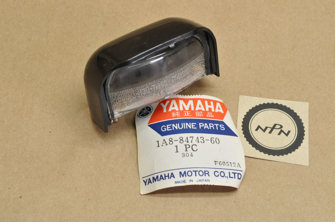 NOS Yamaha 1976-77 XS360 XS500 Tail Light License Plate Lamp Lens Cover 1A8-84743-60