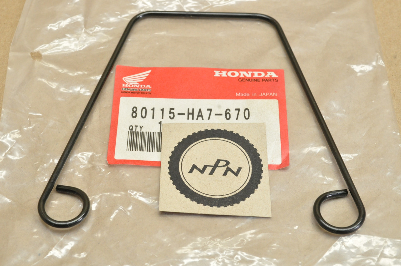 NOS Honda 1986-87 TRX350 TRX350 D Fourtrax Foreman Rear Foot Splash Guard Support 80115-HA7-670