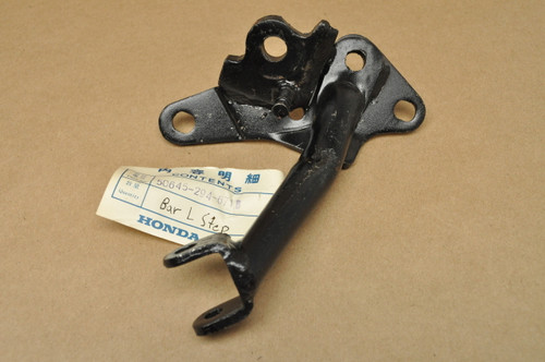 NOS Honda CL450 K3-K5 Left Foot Peg Kick Stand Mount Bracket 50645-294-671 B