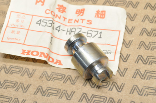 NOS Honda 1986-89 TRX350 Front Wheel Brake Panel Cylinder Piston 45314-HA7-671