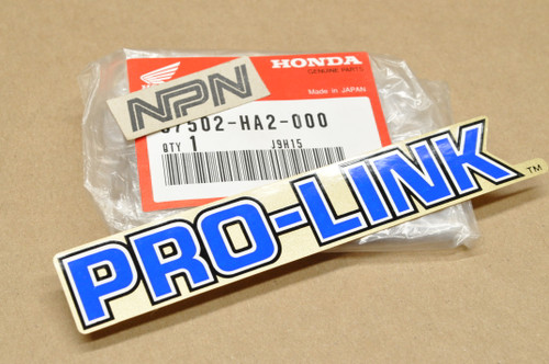 NOS Honda 1985-86 ATC250 R Pro Link Rear Swingarm Emblem Decal 87502-HA2-000