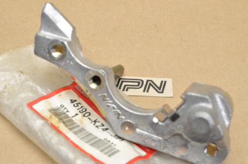 NOS Honda CR125 R CR250 R XR650 Left Front Brake Caliper Bracket 45190-KZ4-J21