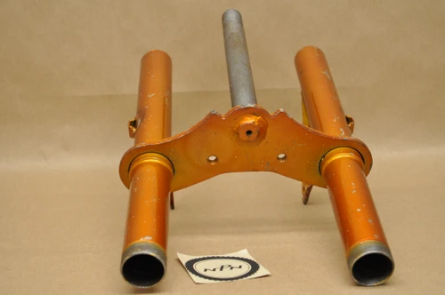 The left tube is bent outwards to the left.