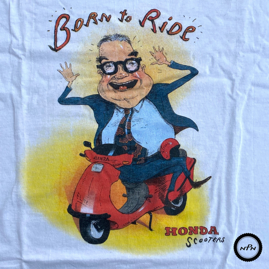 Who is this excited guy on a Honda Scooter?