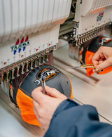 Custom Richardson 112 hats being embroidered in Greer, SC