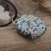 Dalmatian Jasper Palm Stone Hand Wire Wrapped on a Leather Thong Necklace