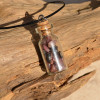 Rhodonite Stones in a Glass Vial on a Leather Cord Necklace
