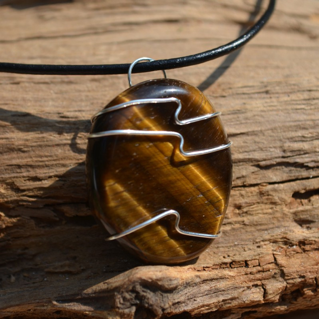 Gold Tiger's Eye Palm Stone Hand Wire Wrapped on a Leather Thong Necklace