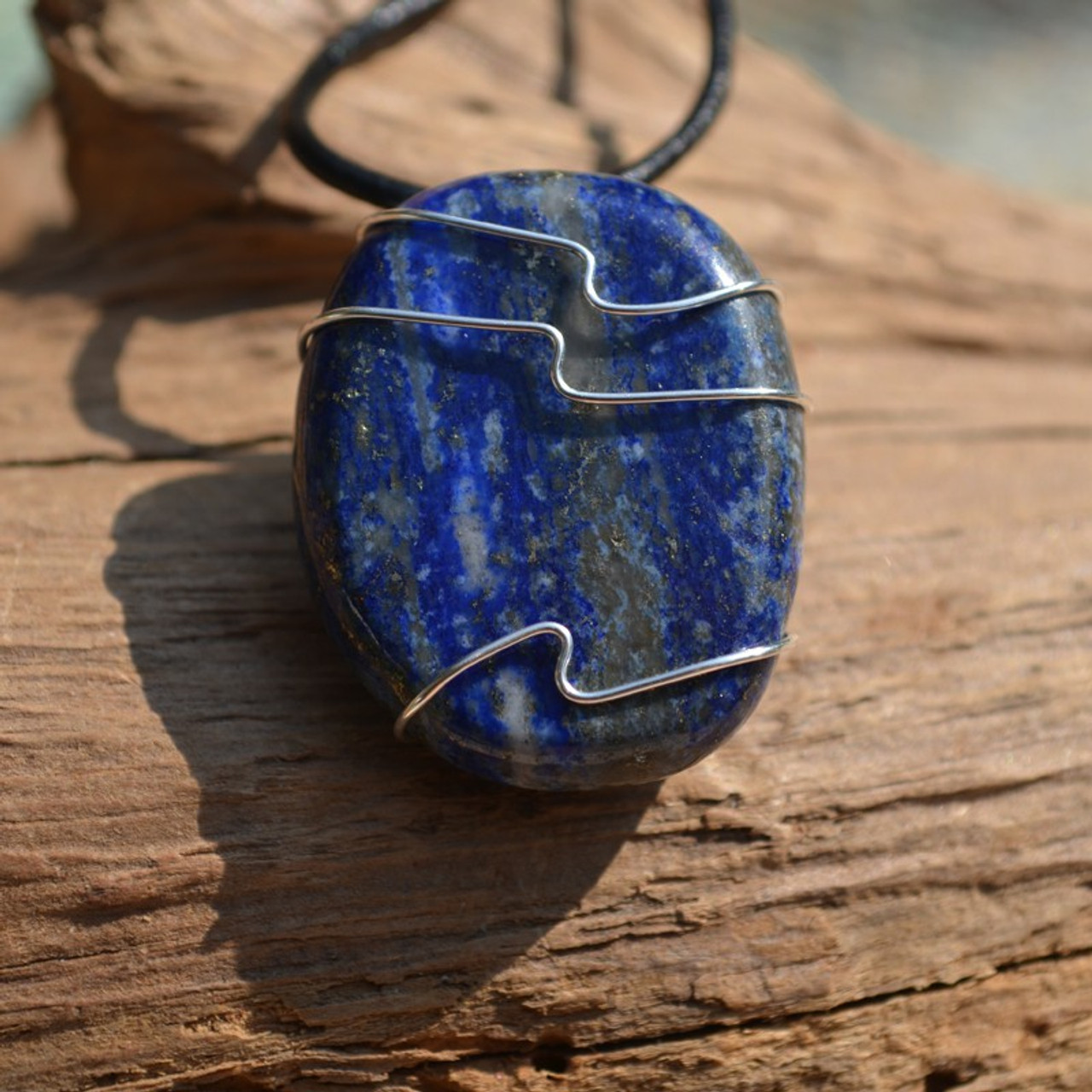 Lapis Lazuli Palm Stone Hand Wire Wrapped on a Leather Thong Necklace 