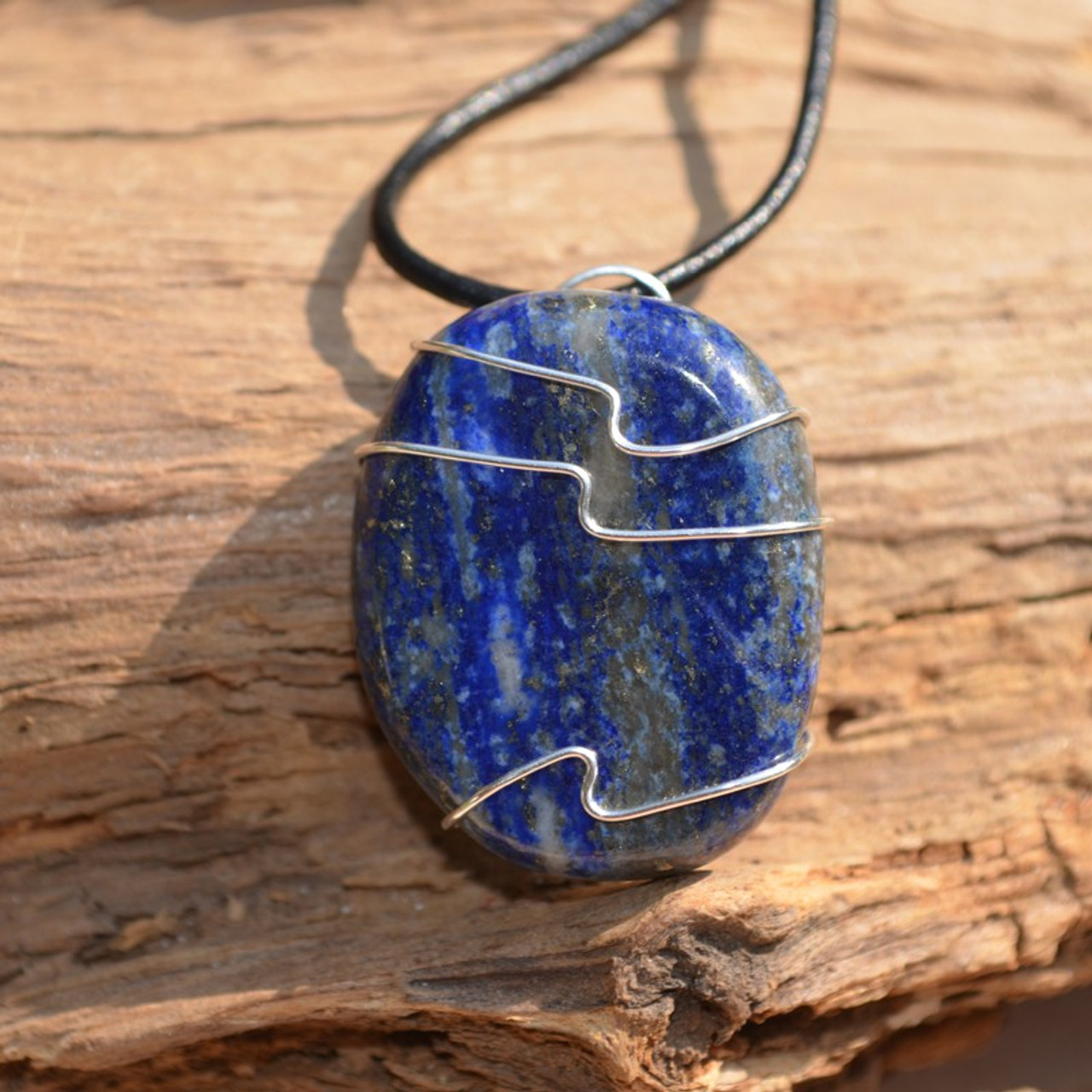 Lapis Lazuli Palm Stone Hand Wire Wrapped on a Leather Thong Necklace 