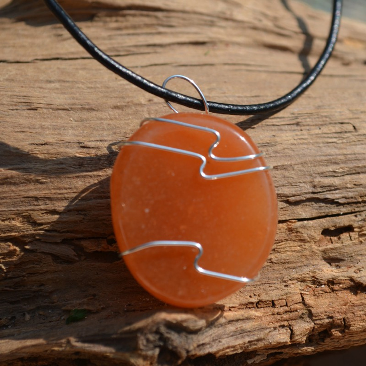 Carnelian Palm Stone Hand Wire Wrapped on a Leather Thong Necklace