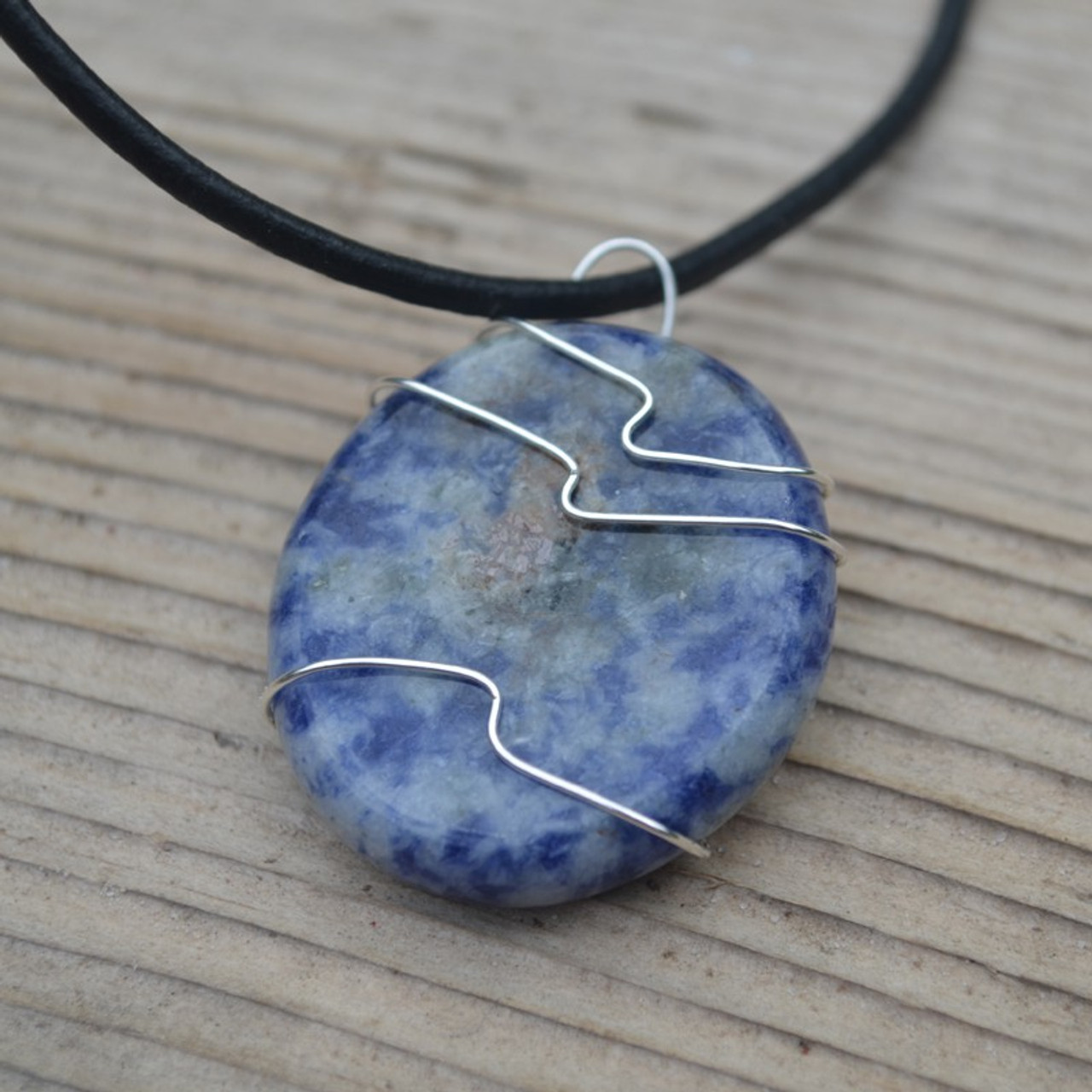 Sodalite Palm Stone Hand Wire Wrapped on a Leather Thong Necklace