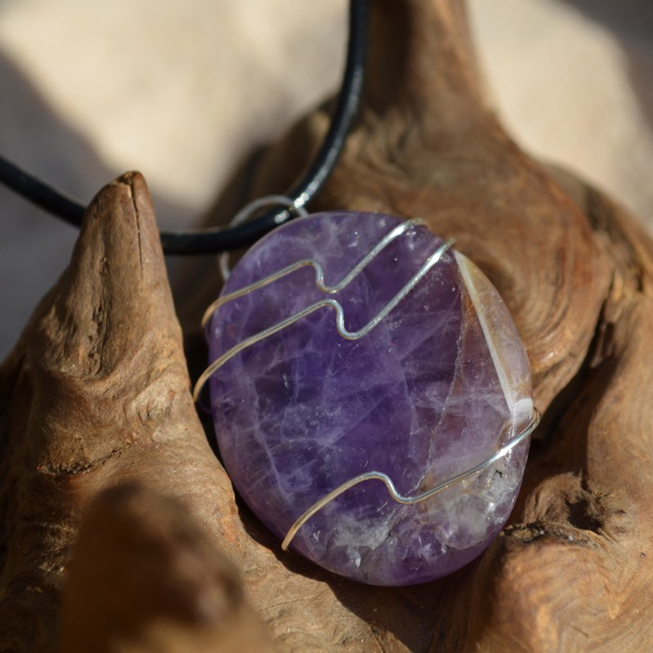 Amethyst Palm Stone Hand Wire Wrapped on a Leather Thong Necklace