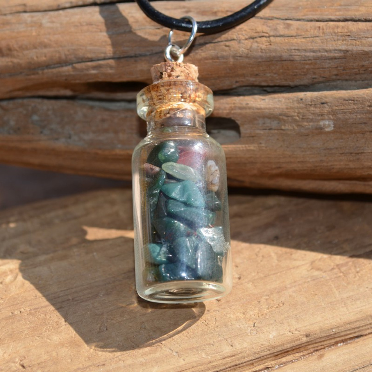 Bloodstones in a Glass Vial on a Leather Cord Necklace 