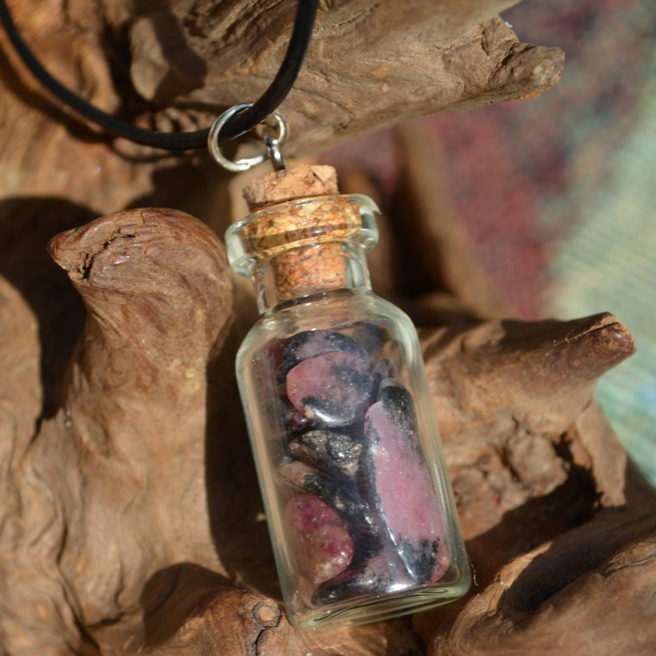 Rhodonite Stones in a Glass Vial on a Leather Cord Necklace