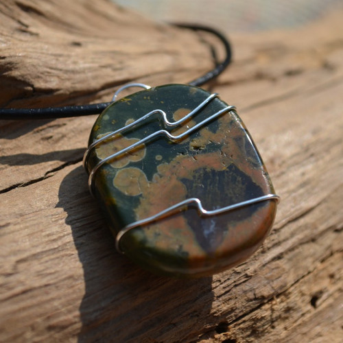 Rhyolite Palm Stone Hand Wire Wrapped on a Leather Thong Necklace