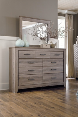 Ashley Zelen Warm Gray King Panel Bed with Mirrored Dresser and Chest