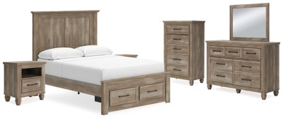 Ashley Yarbeck Sand Queen Panel Bed with Storage with Mirrored Dresser, Chest and 2 Nightstands
