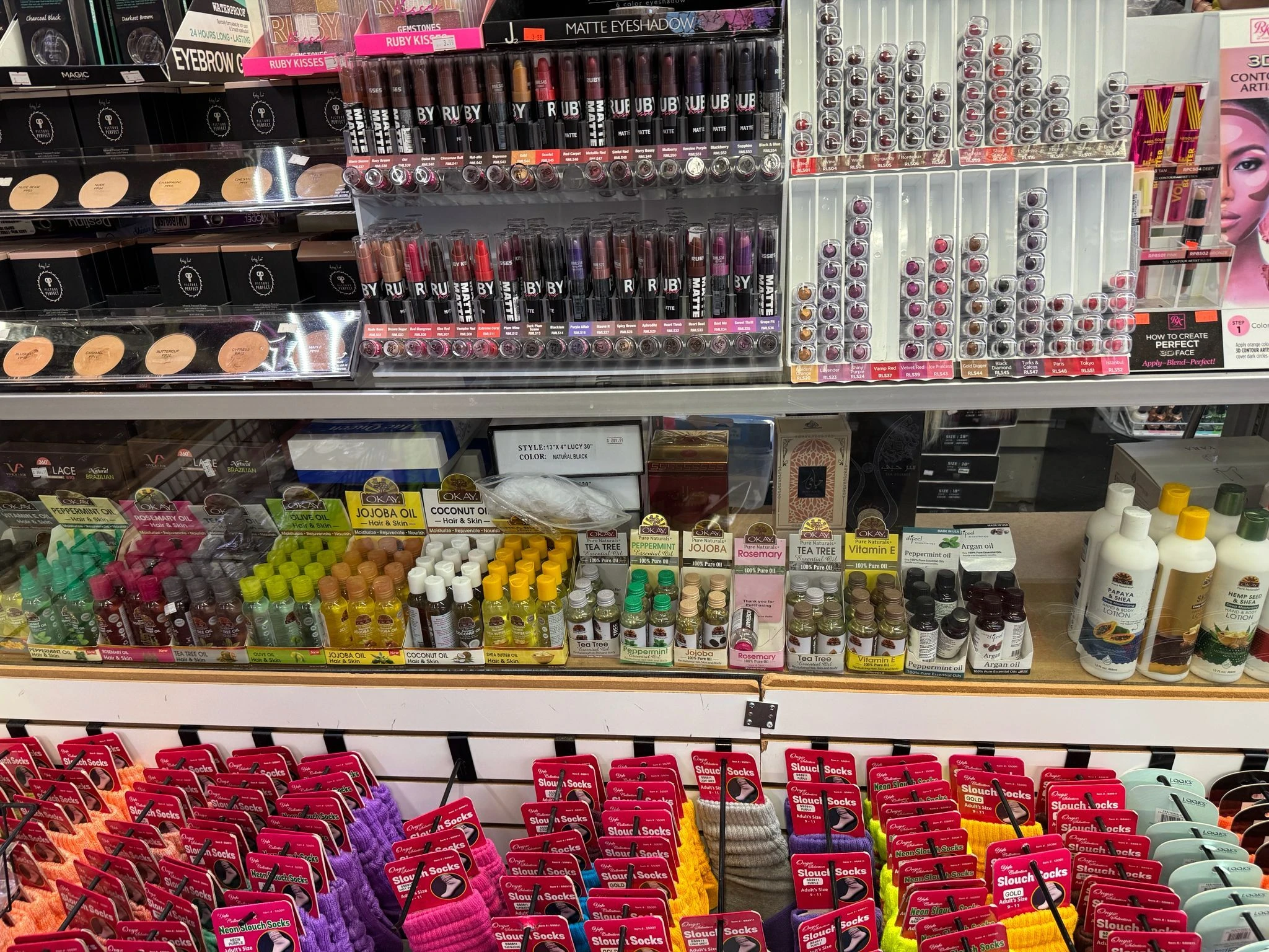 OKAY Pure Naturals colorful product wall display