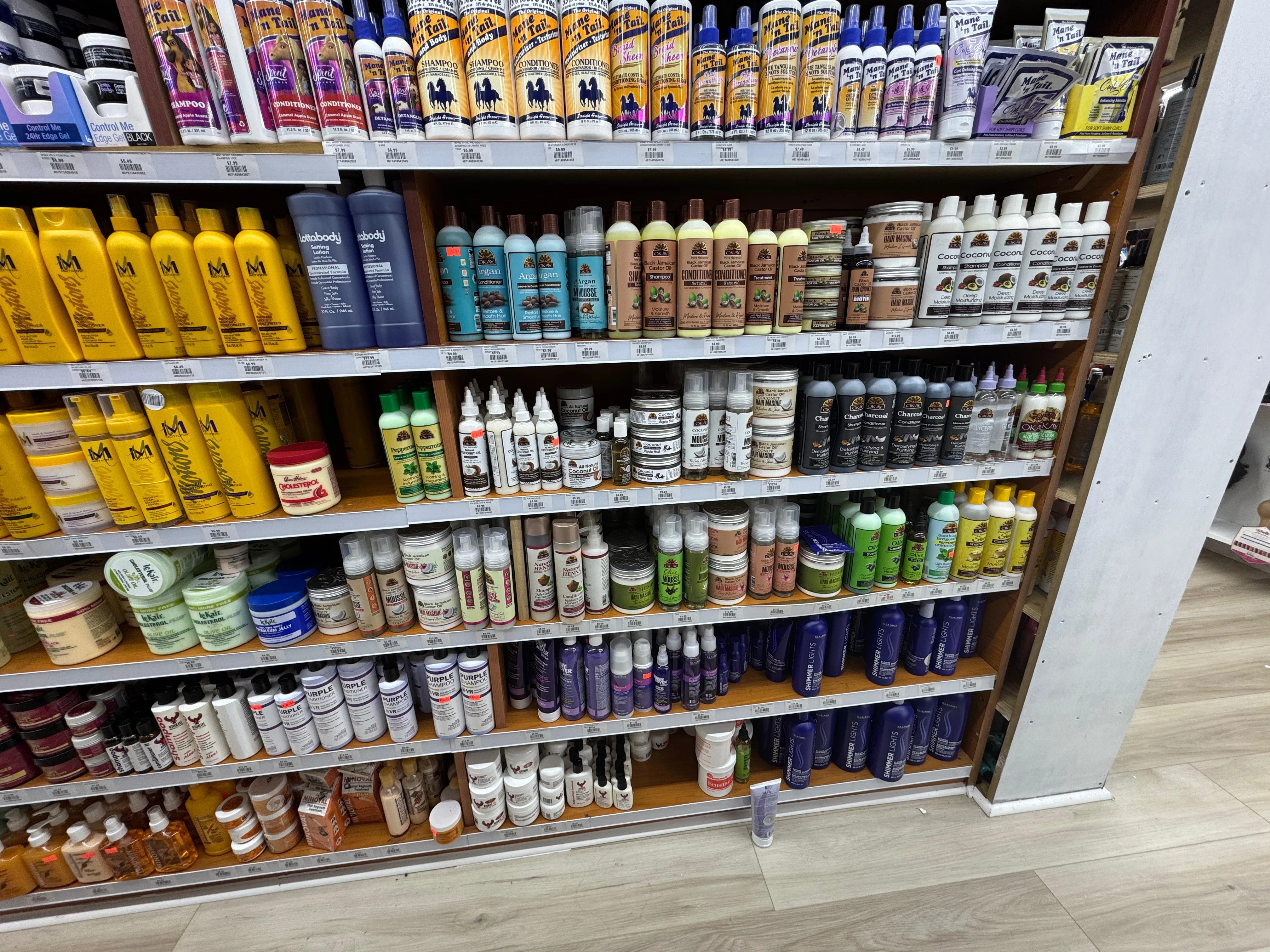 OKAY Pure Naturals hair care product display