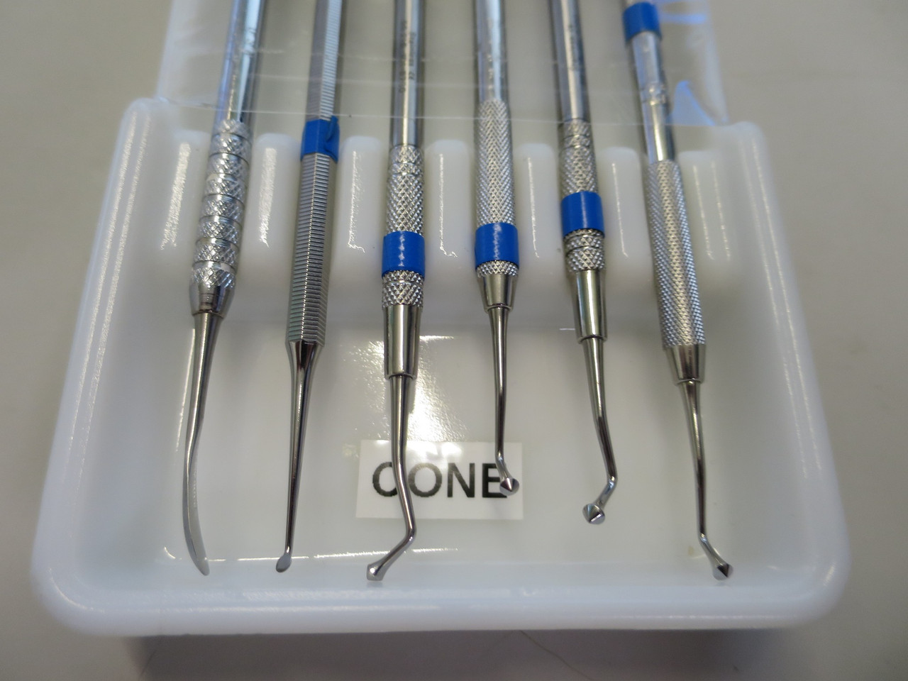 Set of 6 Stainless Steel Dental Cone Instruments in Antique Milk Glass Tray